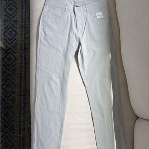 Light Gray Pants with Visible Brand Tag